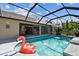 Inviting pool area with a flamingo float offers a fun outdoor space at 1001 Bayvista Dr, Tarpon Springs, FL 34689