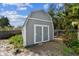 Tall barn style shed with double doors, ready to store all your outdoor tools at 1001 Bayvista Dr, Tarpon Springs, FL 34689