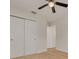 Unfurnished bedroom with hardwood floors, closet, and neutral wall color at 121 Shirley Dr, Largo, FL 33770