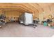 Bright outbuilding interior featuring spray foam insulation and a trailer at 12769 Foresman Blvd, Port Charlotte, FL 33981