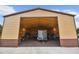 Spacious outbuilding interior featuring a well-lit open space with high ceilings at 12769 Foresman Blvd, Port Charlotte, FL 33981