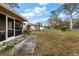 View of the backyard and screened porch area of this charming home at 12845 95Th N St, Largo, FL 33773