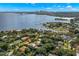 Scenic aerial view of the home near water, with the city skyline and harbor in the background at 140 Miramar Ne Blvd, St Petersburg, FL 33704