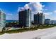 Aerial view of condominium community reveals access to beach, ocean and bay at 1540 Gulf Blvd # Ph7, Clearwater Beach, FL 33767