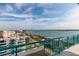 Condo balcony features views of the bay, a tiled deck and turquoise railing at 1540 Gulf Blvd # Ph7, Clearwater Beach, FL 33767