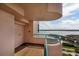 Condo balcony view featuring a pink exterior, a turquoise railing, and stunning water views at 1540 Gulf Blvd # Ph7, Clearwater Beach, FL 33767