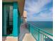 A beautiful view from the condo balcony with turquoise railing and tiled deck at 1540 Gulf Blvd # Ph7, Clearwater Beach, FL 33767