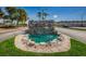 Community rock waterfall fountain at 185 New England Ave # 33, Palm Harbor, FL 34684