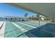 Covered shuffleboard courts overlooking the water, perfect for community enjoyment at 1868 Shore S Dr # 602, South Pasadena, FL 33707