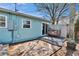 Quaint backyard seating area with pavers and a new sliding glass door at 2661 45Th S St, Gulfport, FL 33711