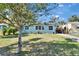 Quaint blue home with a green lawn and white trim at 2661 45Th S St, Gulfport, FL 33711