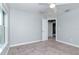 Neutral bedroom featuring carpet, ceiling fan, and access to ensuite bathroom at 3206 Duchess Ct, Plant City, FL 33565