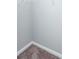 Walk-in closet is carpeted with white wire shelving at 3206 Duchess Ct, Plant City, FL 33565