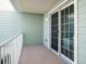 A cozy balcony with a sliding door, providing an excellent private outdoor space at 3266 Mangrove Point Dr, Ruskin, FL 33570