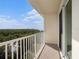 Balcony with white railing offering stunning panoramic views at 3266 Mangrove Point Dr, Ruskin, FL 33570