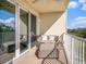 Outdoor balcony with seating and lovely accents at 3266 Mangrove Point Dr, Ruskin, FL 33570