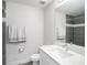 Modern bathroom featuring a vanity, white counter tops, a toilet and a shower at 3266 Mangrove Point Dr, Ruskin, FL 33570