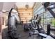 Modern fitness center with exercise machines and equipment, large windows, and a view of the outdoors at 3266 Mangrove Point Dr, Ruskin, FL 33570