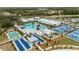 Aerial view of community amenities including a pool, tennis courts, and clubhouse at 9727 Minnow Ray Dr, Land O Lakes, FL 34638