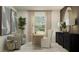 Well-appointed office space with natural light, comfy seating and sleek credenza for storage at 10248 Purple Leaf Ct, Riverview, FL 33578