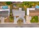 An aerial view showing the home's layout, surrounding yard, and nearby pool at 1489 77Th N Ave, St Petersburg, FL 33702
