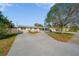 Charming single-story home with a well-maintained yard and long private driveway at 1489 77Th N Ave, St Petersburg, FL 33702