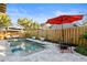 Backyard pool and patio area with multiple seating areas and lush landscaping for privacy and relaxation at 202 13Th N Ave, St Petersburg, FL 33701