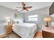 Bedroom featuring a ceiling fan, a window, hardwood flooring, and neutral gray colored walls at 2731 56Th N Ln, St Petersburg, FL 33710