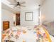Sunlit bedroom with a ceiling fan and a comfortable bed at 2821 Coral Way, Punta Gorda, FL 33950