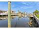 Scenic canal view, showcasing the waterfront living and lush surroundings at 2821 Coral Way, Punta Gorda, FL 33950