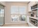 Kitchen area featuring stainless steel appliances and a view of the outdoor patio at 2821 Coral Way, Punta Gorda, FL 33950