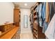 Walk-in closet with shelves and storage for organizing clothes and shoes at 2821 Coral Way, Punta Gorda, FL 33950