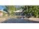 Inviting single-story home showcasing a classic design and a welcoming screened front porch at 3201 N 15Th St, Tampa, FL 33605