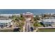 Overhead shot of a neighborhood surrounded by canals featuring beautiful landscaping and docks at 5092 Beach Se Dr # D, St Petersburg, FL 33705