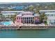 An aerial view of the property showcasing a pool and dock with access to the waterfront at 5092 Beach Se Dr # D, St Petersburg, FL 33705