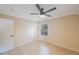 Bedroom featuring a ceiling fan and tiled floors at 5092 Beach Se Dr # D, St Petersburg, FL 33705