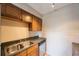 Kitchen with stainless steel dishwasher and double basin sink at 5092 Beach Se Dr # D, St Petersburg, FL 33705