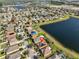 Beautiful aerial view showcasing a neighborhood with tranquil lakes and lush green spaces, highlighting community charm at 715 Parker Den Dr, Ruskin, FL 33570
