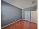 Bedroom with hard floors and a closet offers a comfortable and functional space at 715 Parker Den Dr, Ruskin, FL 33570