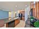 Modern kitchen with granite countertops, island, and stainless appliances, perfect for cooking at 715 Parker Den Dr, Ruskin, FL 33570