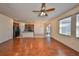 Spacious living room boasts hardwood floors, natural light, and an open-concept design at 715 Parker Den Dr, Ruskin, FL 33570