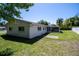 Spacious backyard featuring a screened lanai perfect for enjoying the outdoors at 2391 66Th S Ter, St Petersburg, FL 33712