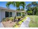 Charming single-story home featuring mature landscaping and a well-manicured lawn at 2391 66Th S Ter, St Petersburg, FL 33712