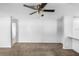 Neutral living room with a ceiling fan and ample space at 2391 66Th S Ter, St Petersburg, FL 33712