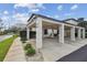 Covered carport area providing parking with well-maintained landscaping and signage at 4502 Southampton Ct # 4502, Tampa, FL 33618