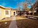 Backyard view showing a pathway to a screened porch and trampoline at 2734 53Rd N Ave, St Petersburg, FL 33714