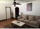 Living room with hardwood floors, sofa, and coffee table at 2734 53Rd N Ave, St Petersburg, FL 33714