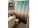 Small bathroom with shower, toilet, and vanity at 5634 5Th N Ave, St Petersburg, FL 33710