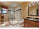 Bathroom with a large glass shower and dark vanity at 33642 Blanton Rd, Dade City, FL 33523