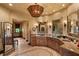 Elegant bathroom with double vanities and large mirrors at 33642 Blanton Rd, Dade City, FL 33523
